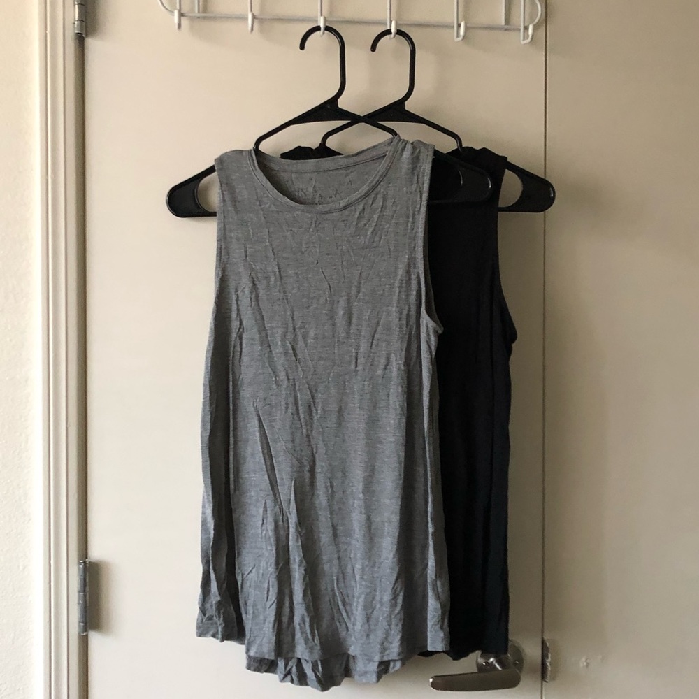 A New Day muscle tanks